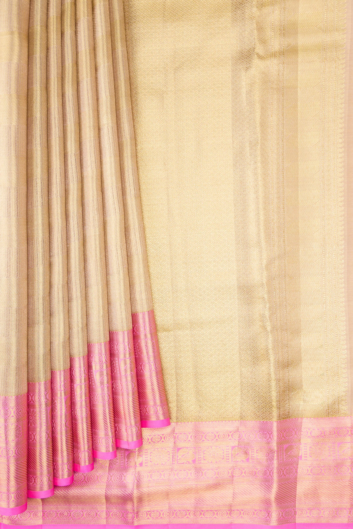 Pleats and pallu of Gold Dual Tone Kanchipuram Tissue Silk Saree with Zari Brocade on the body and Zari Border. 