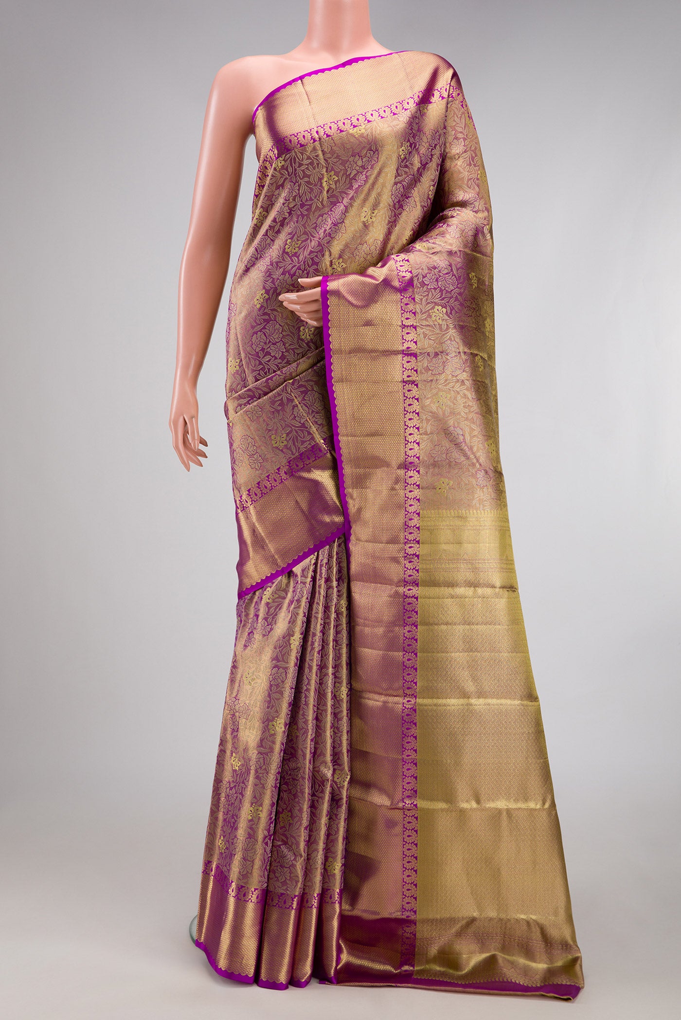 Purple Dual Tone Kanchipuram Tissue Silk Saree with Zari Brocade on the body and Zari Border.  displayed on a mannequin