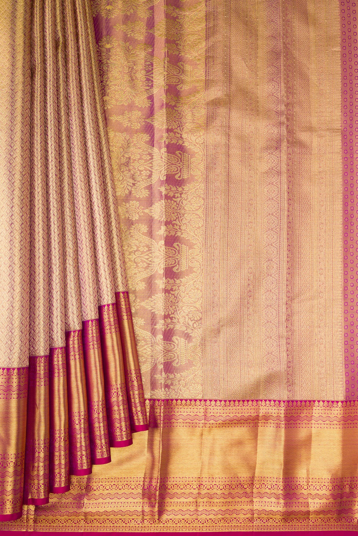 Pleats and pallu of Gold Dual Tone Kanchipuram Tissue Silk Saree with Zari Brocade on the body and Fancy Border. 