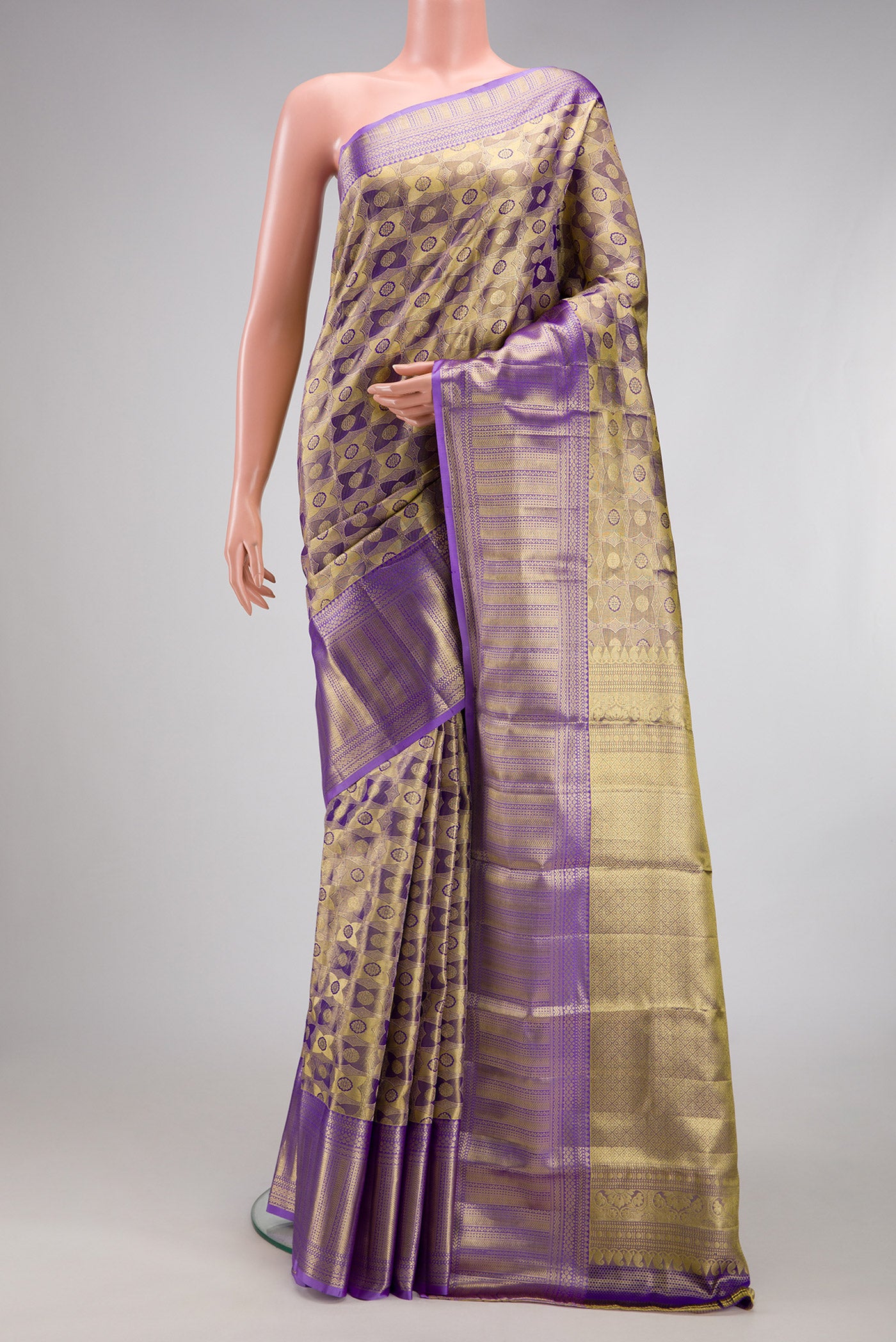 Lavender Dual Tone Kanchipuram Tissue Silk Saree with Zari Brocade on the body and Zari Border.  displayed on a mannequin