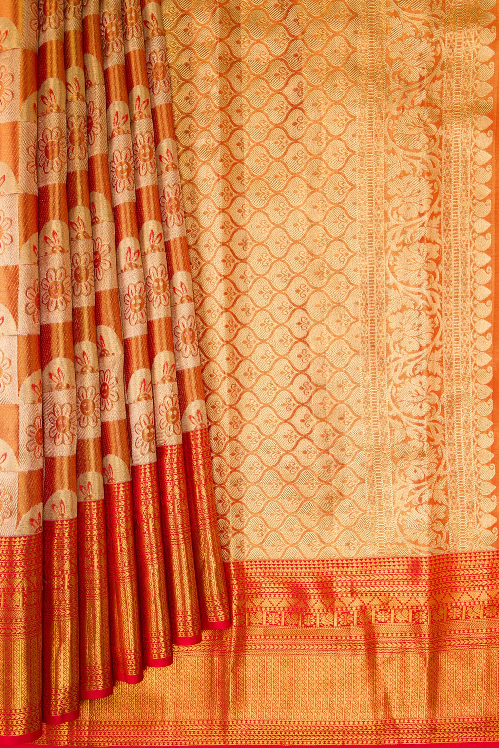 Pleats and pallu of Gold Dual Tone Kanchipuram Tissue Silk Saree with Zari Brocade on the body and Zari Border. 