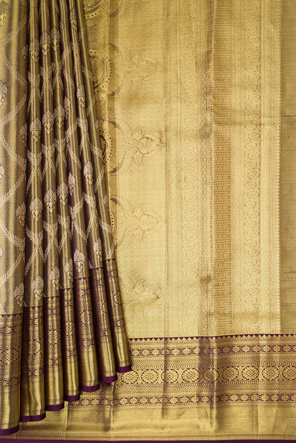 Pleats and pallu of Mehandi Green Dual Tone Kanchipuram Tissue Silk Saree with Zari Brocade on the body and Zari Border. 