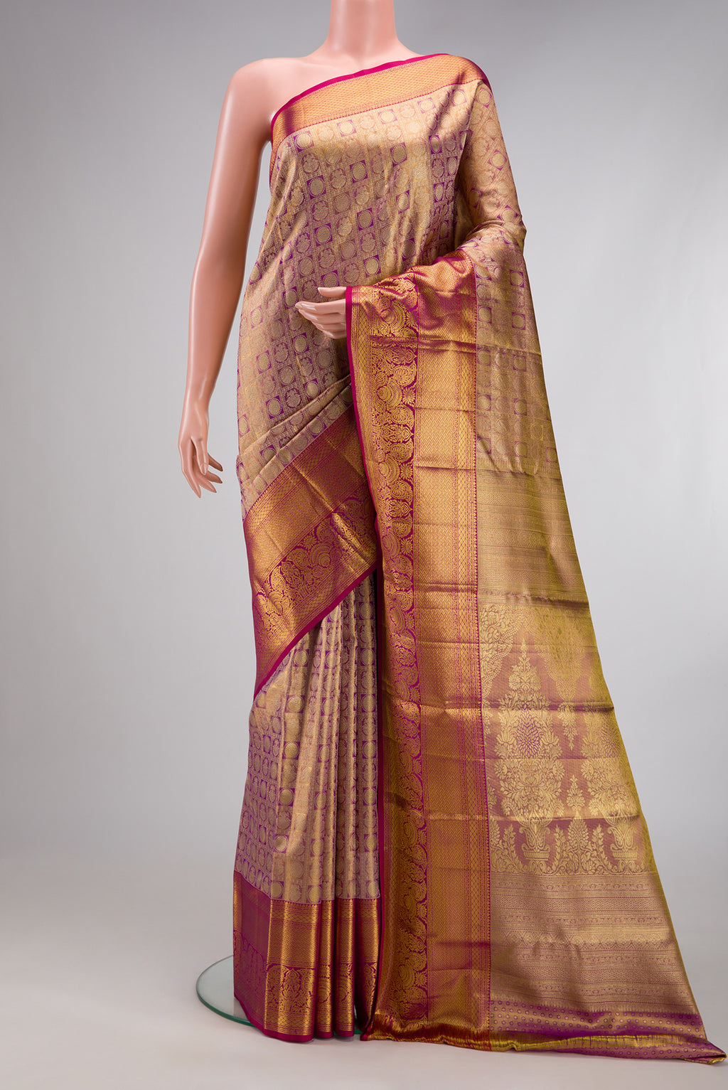 Purple Dual Tone Kanchipuram Tissue Silk Saree with Zari Brocade on the body and Zari Border.  displayed on a mannequin