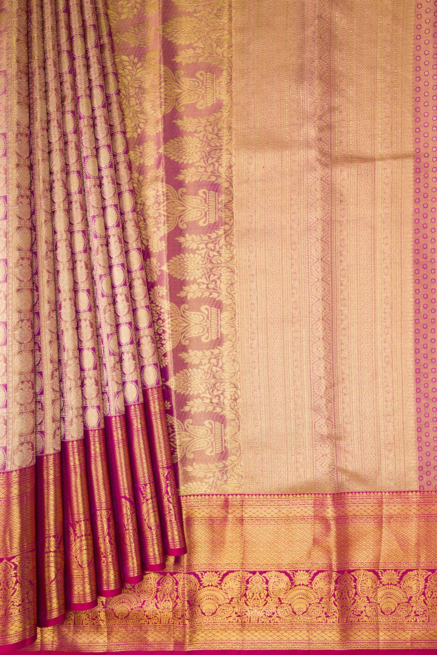 Pleats and pallu of Purple Dual Tone Kanchipuram Tissue Silk Saree with Zari Brocade on the body and Zari Border. 