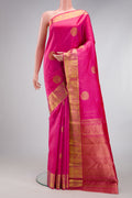 Pink Kanjivaram Silk Saree with Zari Butta on the body and Zari Border.  displayed on a mannequin