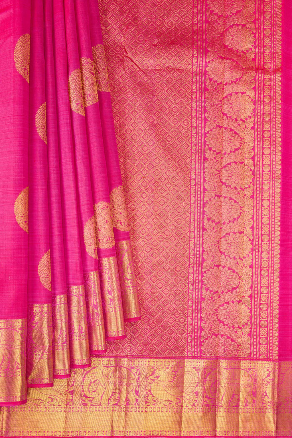 Pleats and pallu of Pink Kanjivaram Silk Saree with Zari Butta on the body and Zari Border. 
