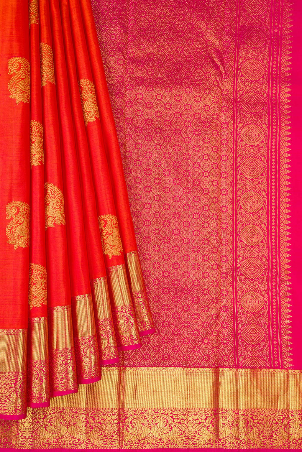 Pleats and pallu of Orange Kanjivaram Silk Saree with Zari Butta on the body and Zari Border. 
