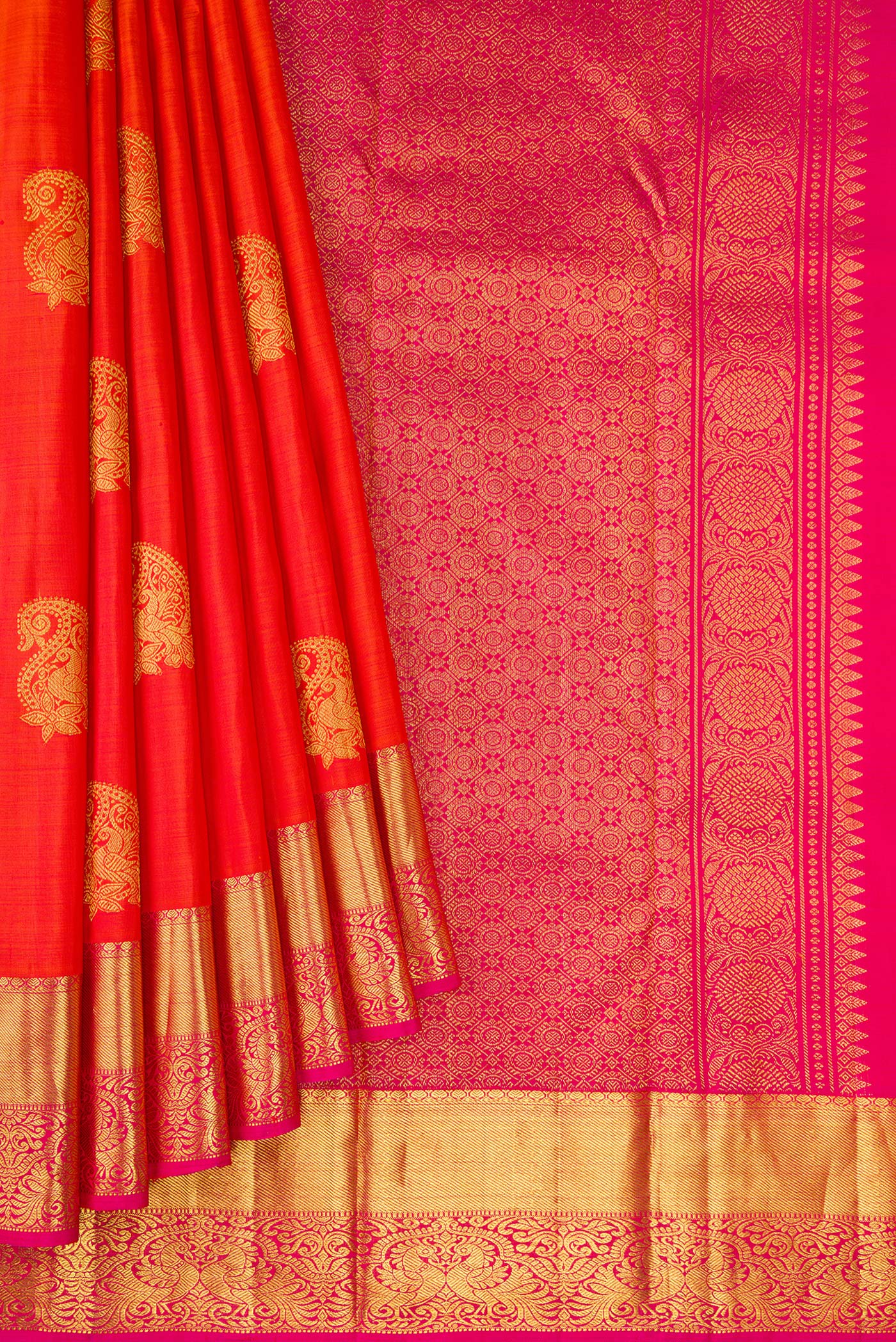 Pleats and pallu of Orange Kanjivaram Silk Saree with Zari Butta on the body and Zari Border. 