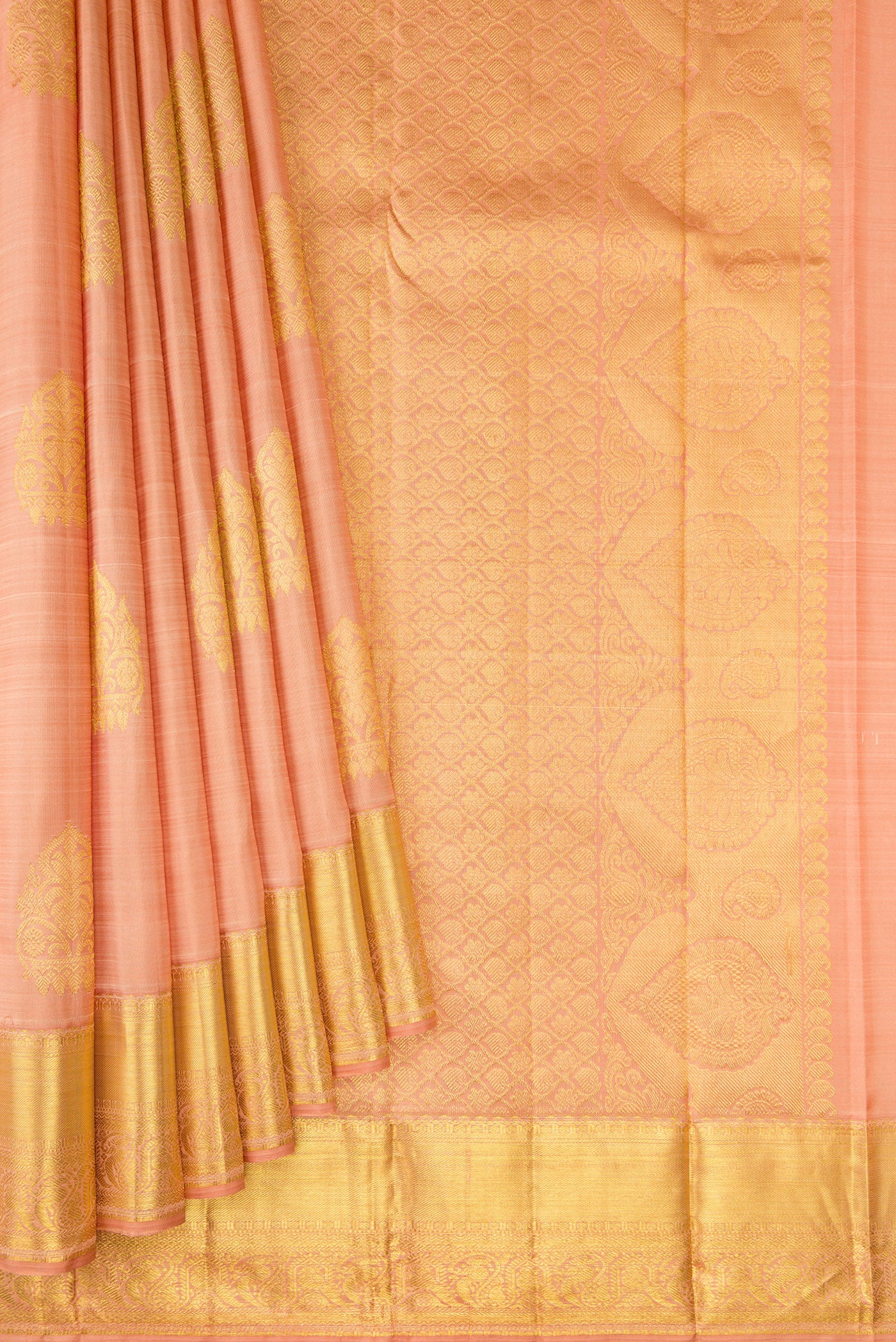 Pleats and pallu of Peach Kanjivaram Silk Saree with Zari Butta on the body and Zari Border. 
