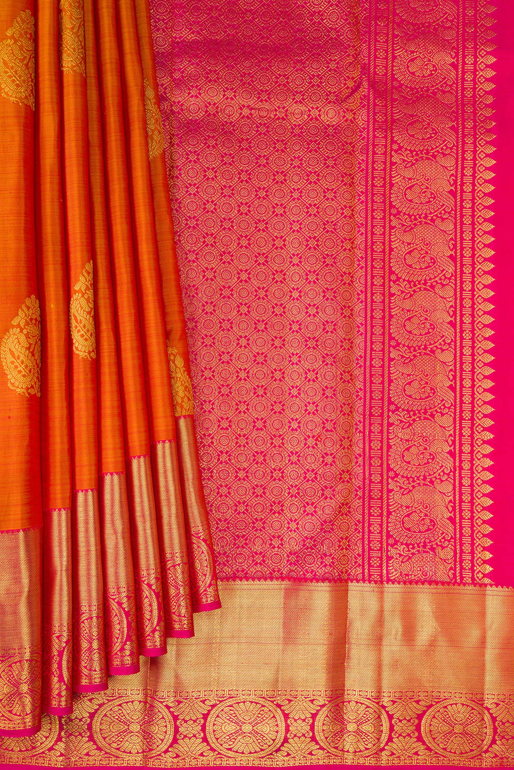 Pleats and pallu of Mustard Kanjivaram Silk Saree with Zari Butta on the body and Zari Border. 