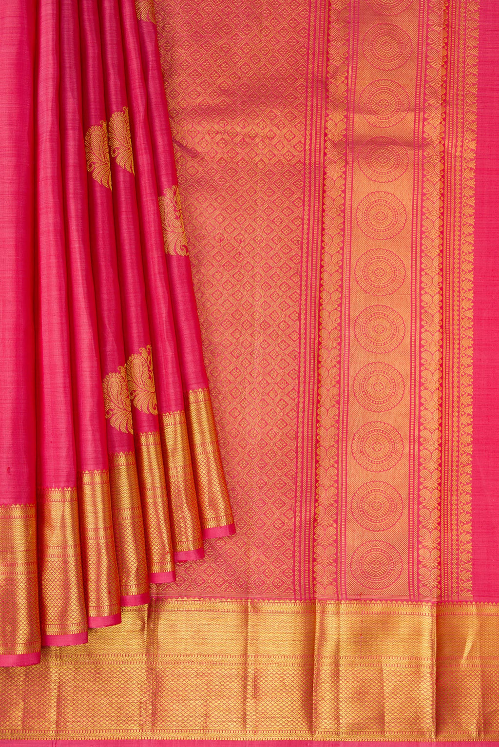 Pleats and pallu of Pink Kanjivaram Silk Saree with Zari Butta on the body and Zari Border. 
