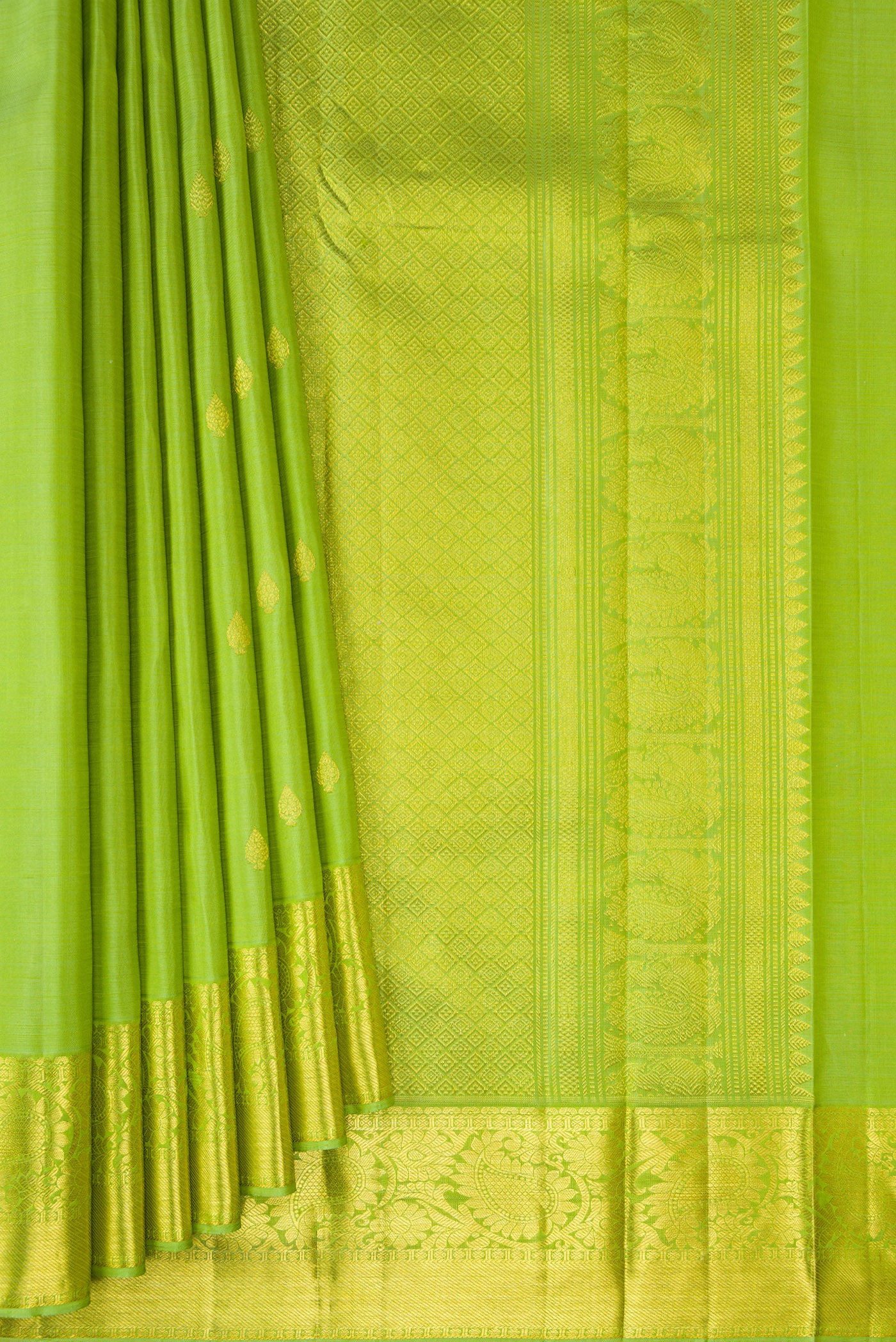 Pleats and pallu of Pista Green Kanjivaram Silk Saree with Zari Butta on the body and Zari Border. 