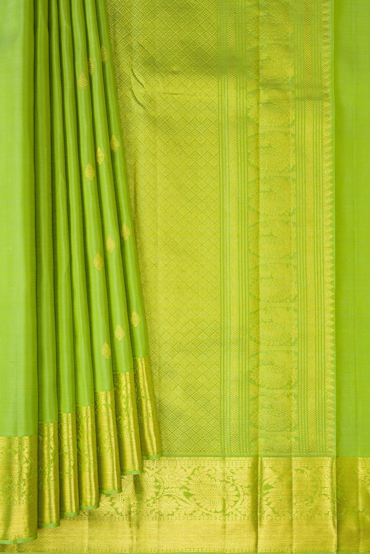 Pleats and pallu of Pista Green Kanjivaram Silk Saree with Zari Butta on the body and Zari Border. 