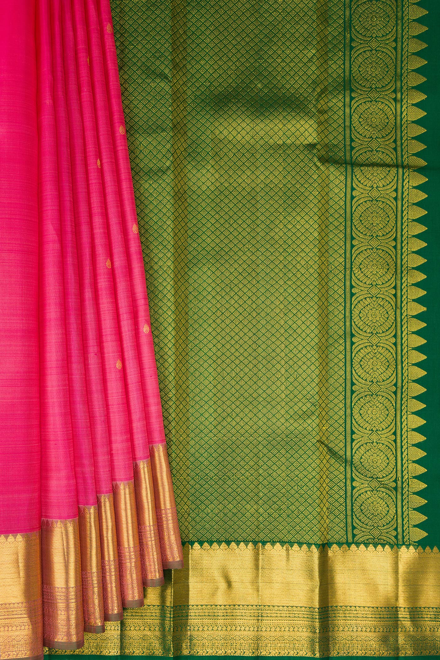 Pleats and pallu of Pink Kanjivaram Silk Saree with Zari Butta on the body and Zari Border. 