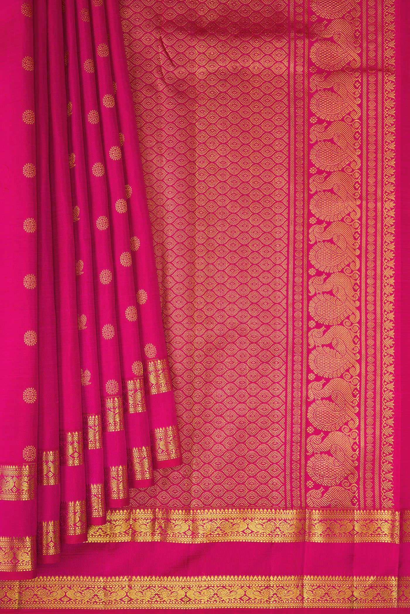 Pleats and pallu of Rani Pink Kanjivaram Silk Saree with Zari Butta on the body and Zari Border. 