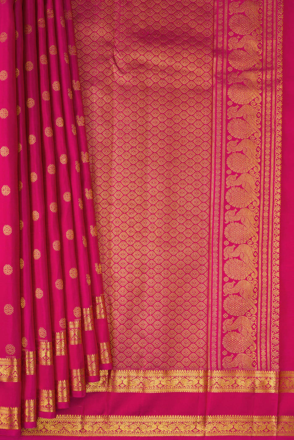 Pleats and pallu of Dark Pink Kanjivaram Silk Saree with Zari Butta on the body and Zari Border. 