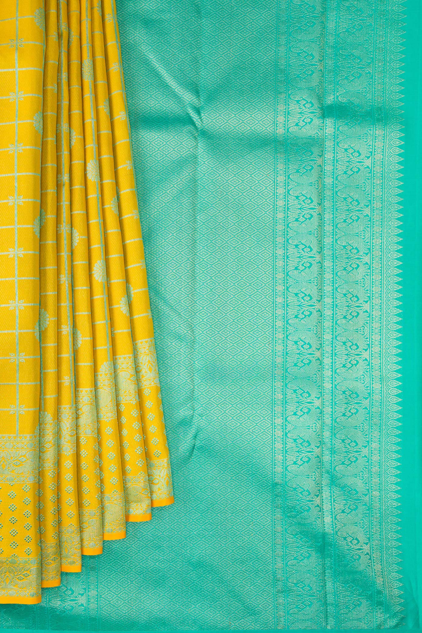 Pleats and pallu of Pure Silk Yellow Kanjivaram Saree with Checked design on the body and Fancy Border. 