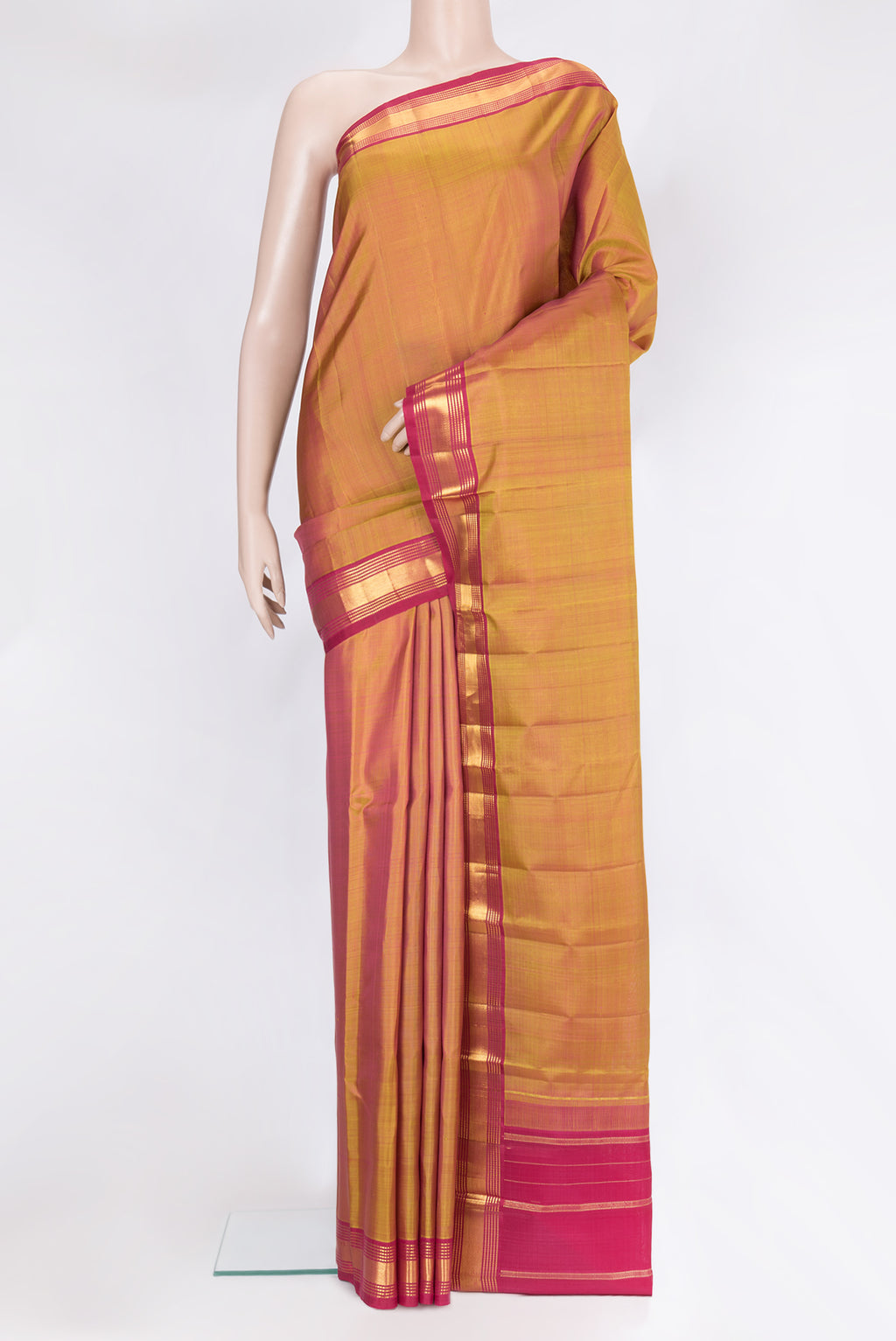 Mustard Dual Tone Kanjivaram Silk Saree with Plain Body and Zari Border.  displayed on a mannequin