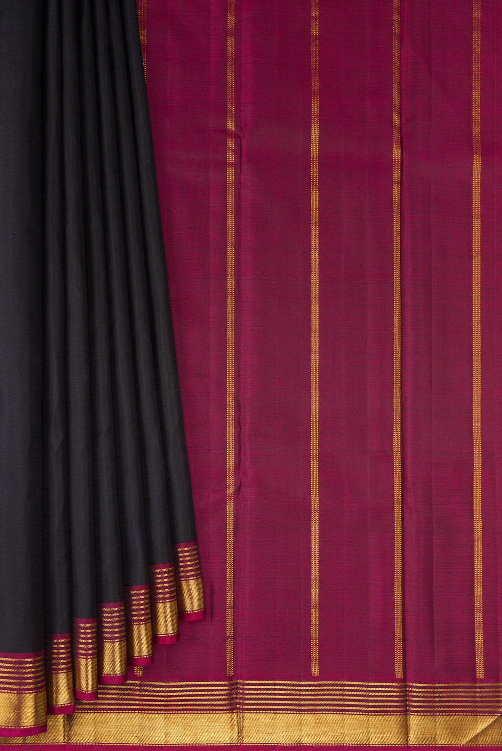 Pleats and pallu of Black Kanjivaram Silk Saree with Plain Body and Zari Border. 