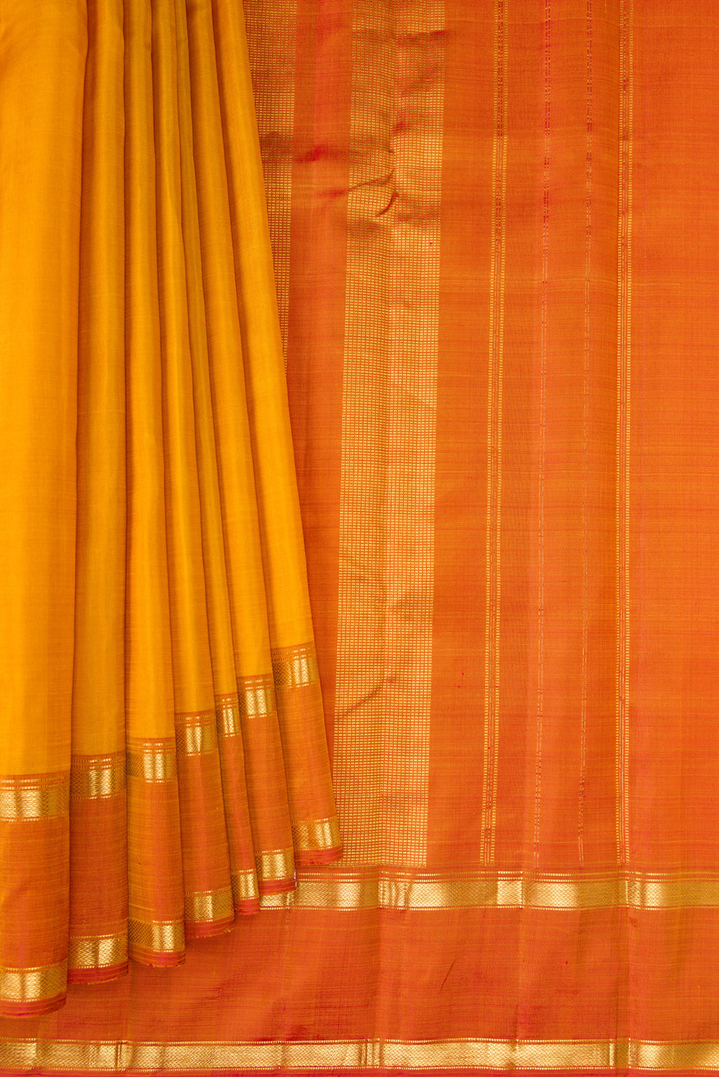 Pleats and pallu of Mustard Kanjivaram Silk Saree with Plain Body and Zari Border. 