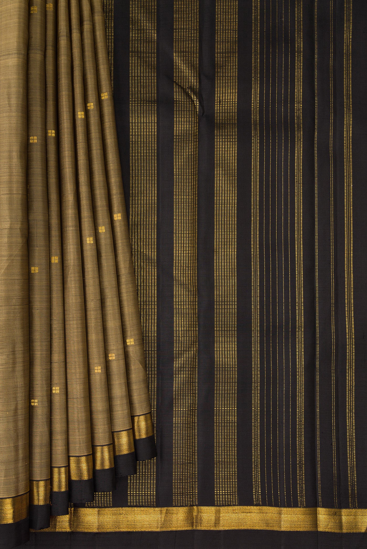Pleats and pallu of Dark Beige Kanjivaram Silk Saree with Zari Butta on the body and Zari Border. 