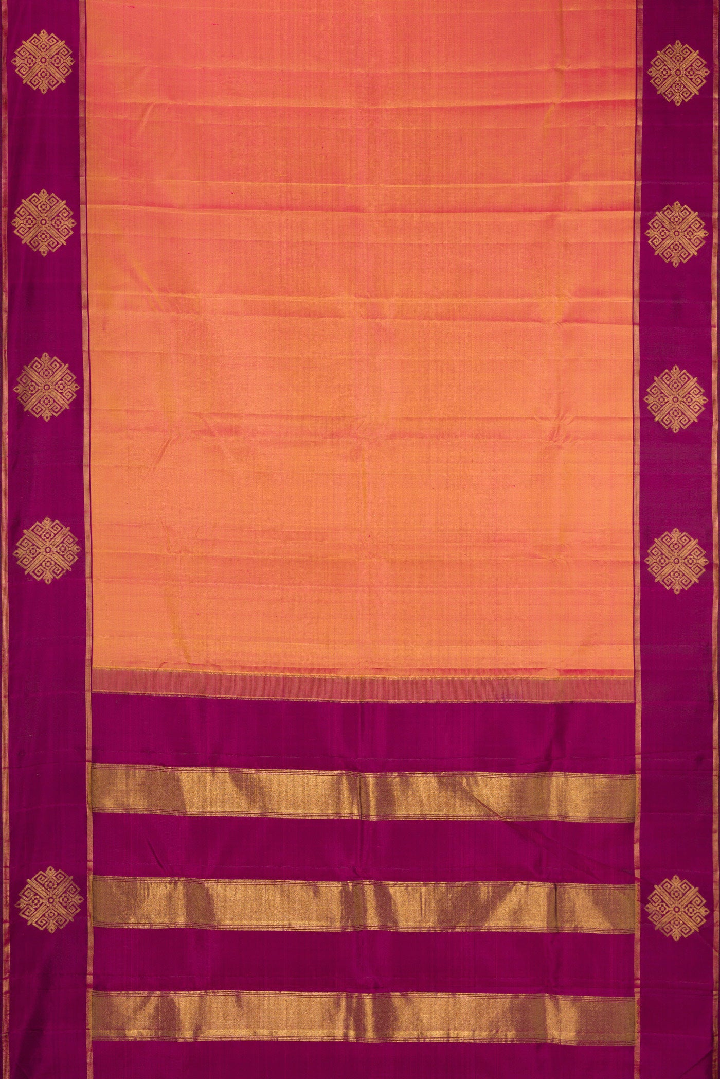 Flat view of Pinkish Yellow Dual Tone Kanchipuram Silk Saree with Plain Body and Fancy Border. 