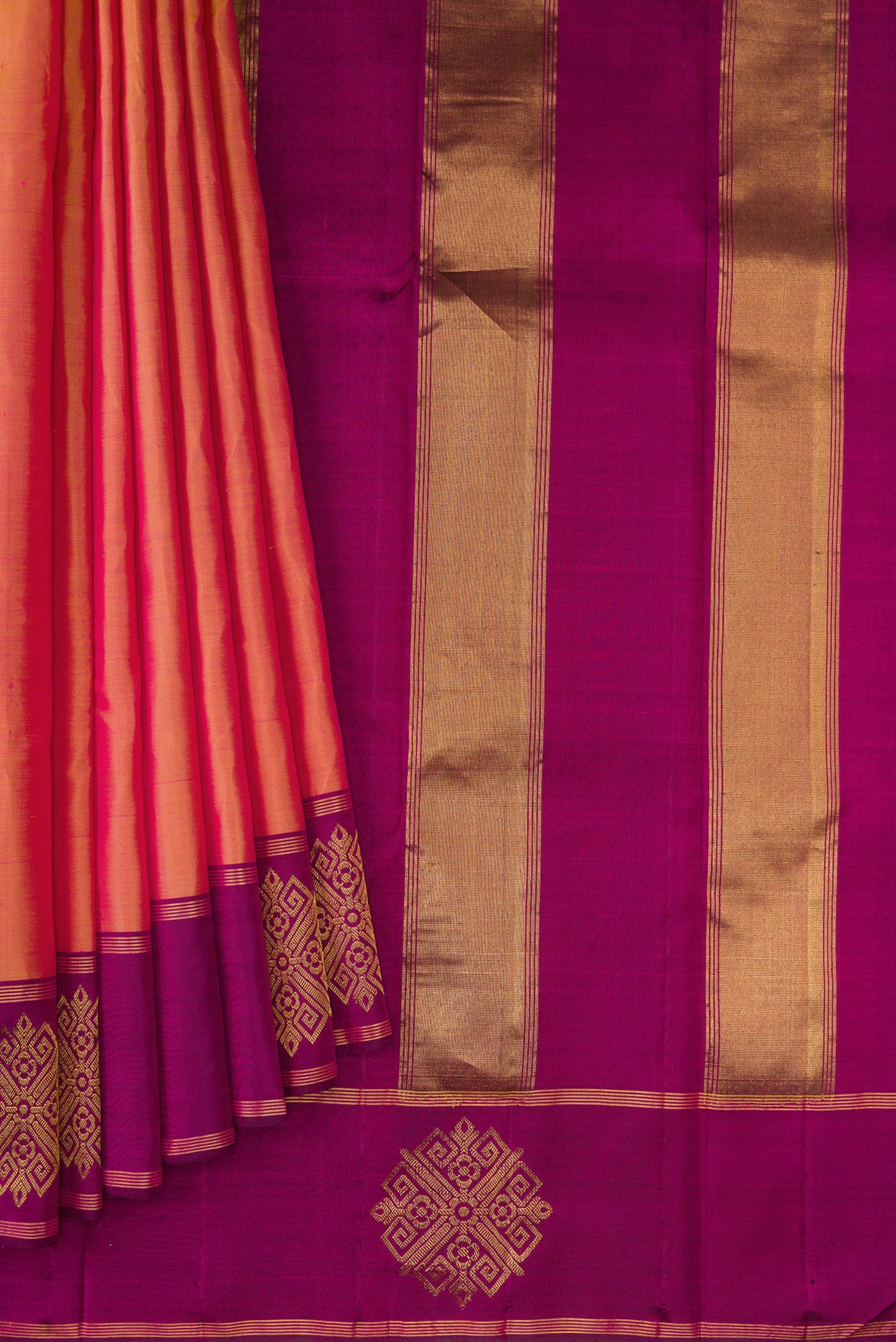 Pleats and pallu of Pinkish Yellow Dual Tone Kanchipuram Silk Saree with Plain Body and Fancy Border. 