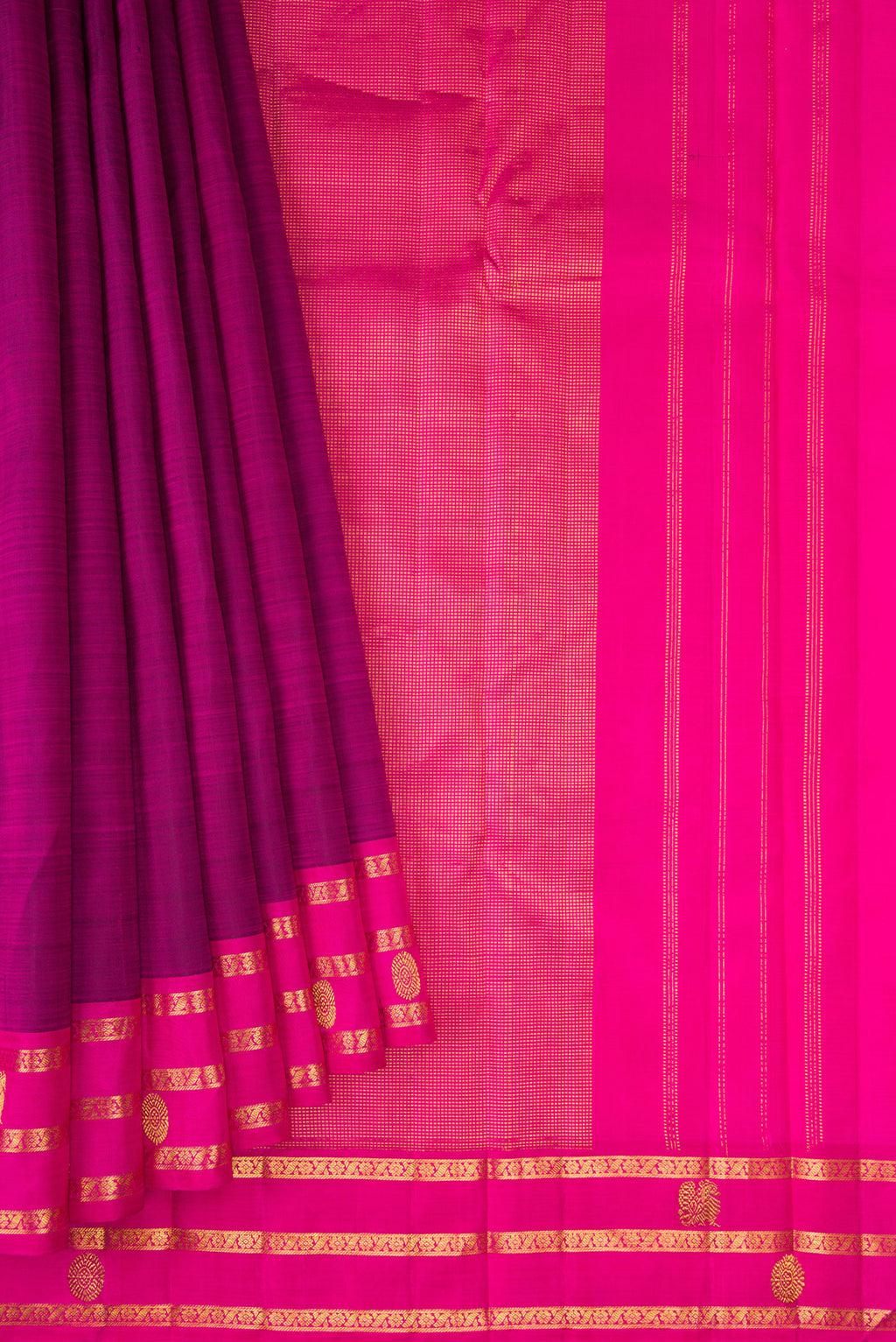 Pleats and pallu of Purple Kanchipuram Silk Saree with Plain Body and Zari Border. 
