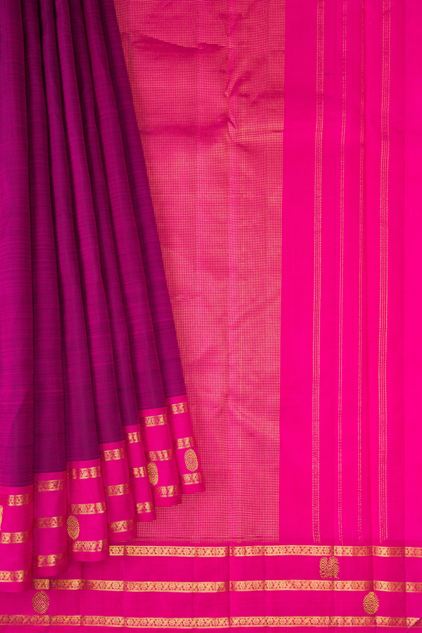 Pleats and pallu of Purple Kanchipuram Silk Saree with Plain Body and Zari Border. 