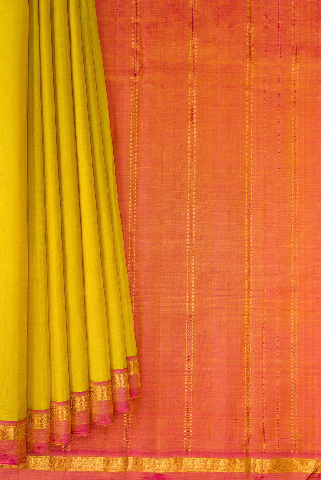 Pleats and pallu of Yellow Dual Tone Kanjivaram Silk Saree with Plain Body and Zari Border. 