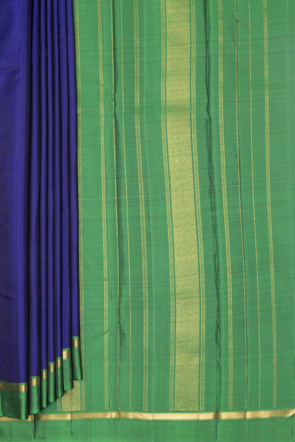 Pleats and pallu of Blue Kanjivaram Silk Saree with Plain Body and Zari Border. 