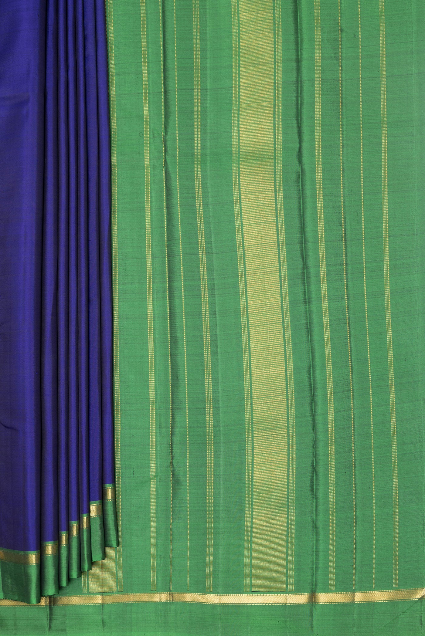 Pleats and pallu of Blue Kanjivaram Silk Saree with Plain Body and Zari Border. 