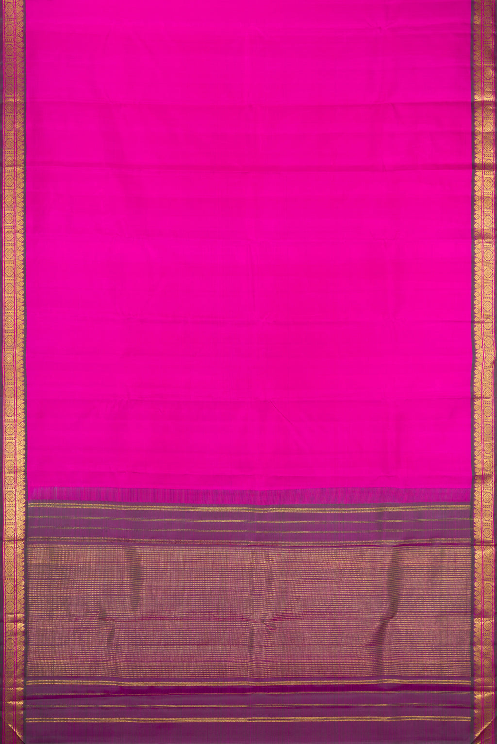 Flat view of Magenta Kanchipuram Silk Saree with Plain Body and Zari Border. 