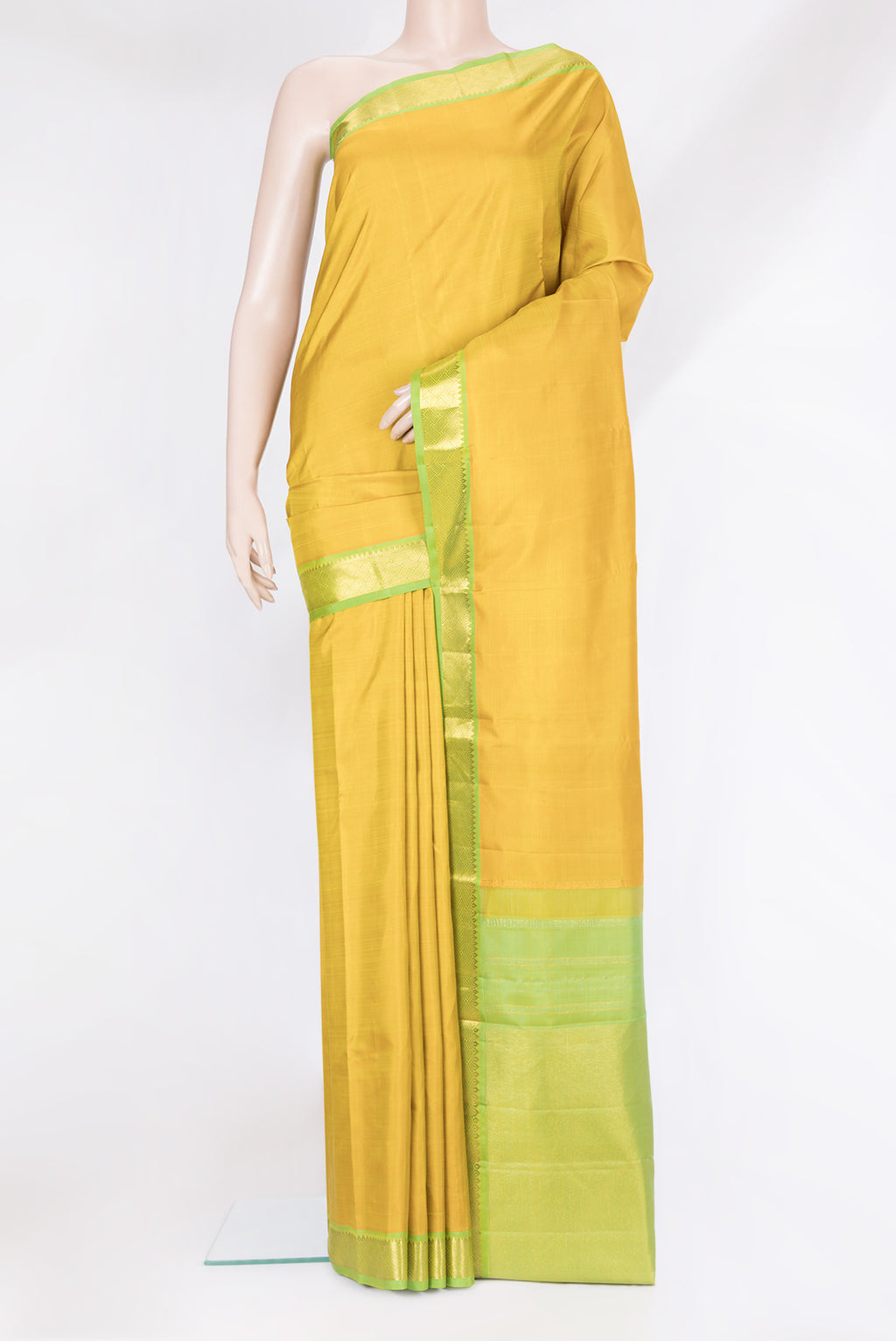 Lemon Yellow Kanchipuram Silk Saree with Plain Body and Zari Border.  displayed on a mannequin
