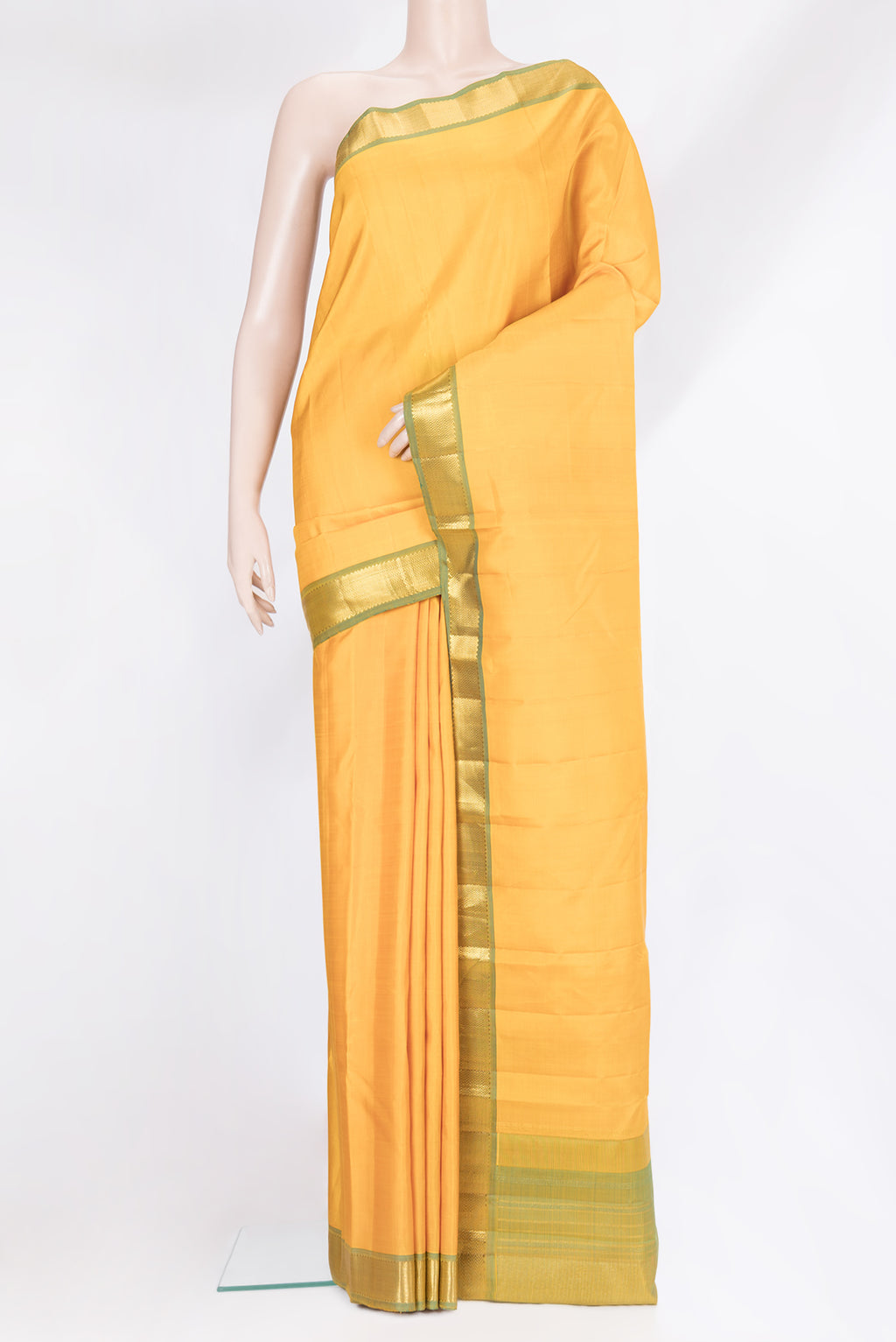 Yellow Kanchipuram Silk Saree with Plain Body and Zari Border.  displayed on a mannequin