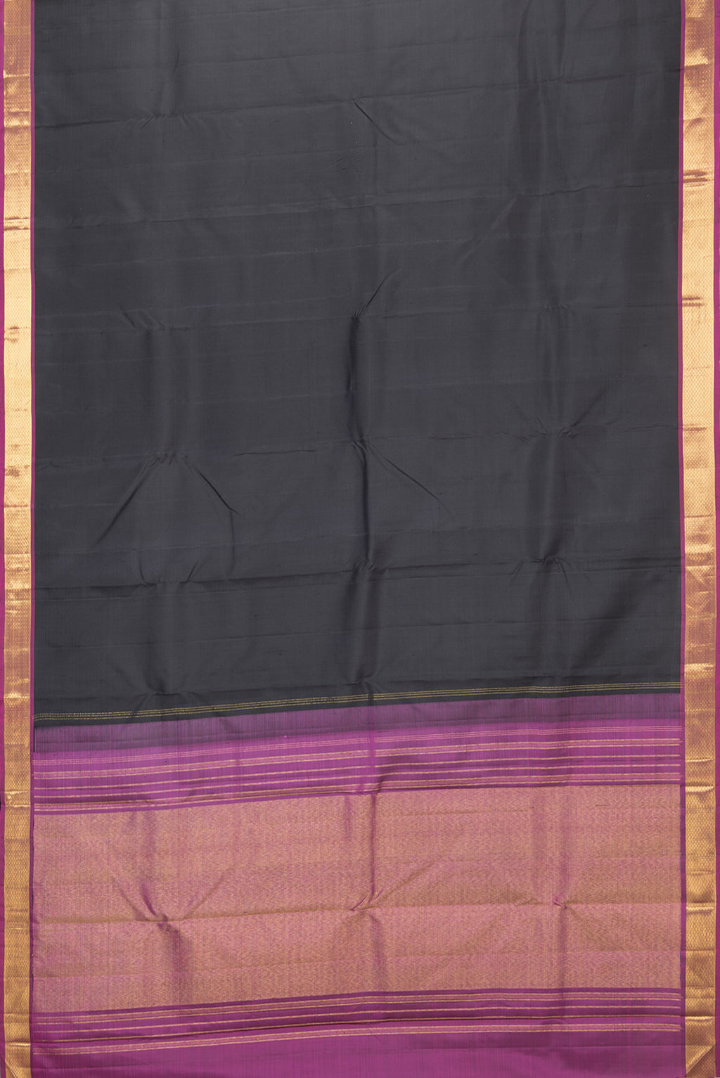 Flat view of Black Kanchipuram Silk Saree with Plain Body and Zari Border. 