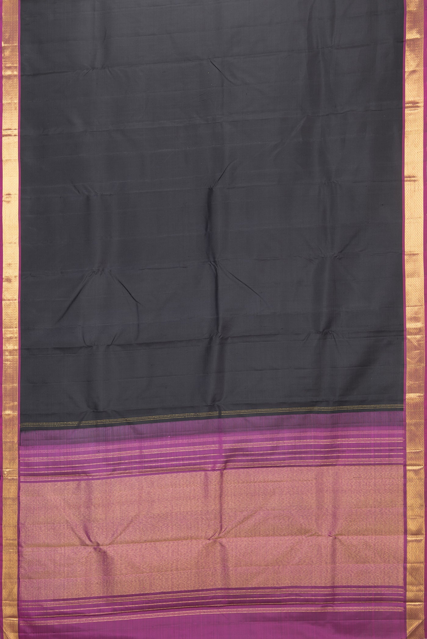 Flat view of Black Kanchipuram Silk Saree with Plain Body and Zari Border. 