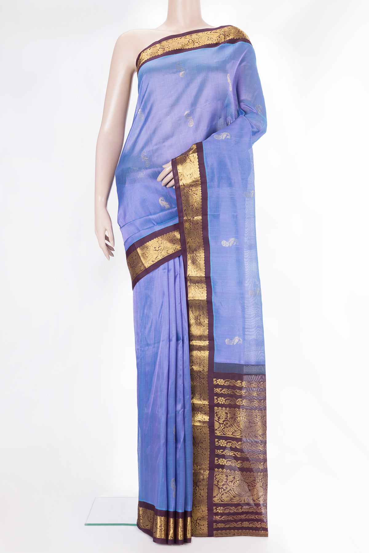 Maya Blue Silk Cotton Saree with Zari Butta on the body and Zari Border.  displayed on a mannequin
