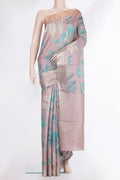 Rose Gold Tussar Saree with Floral Print on the body and Zari Border.  displayed on a mannequin