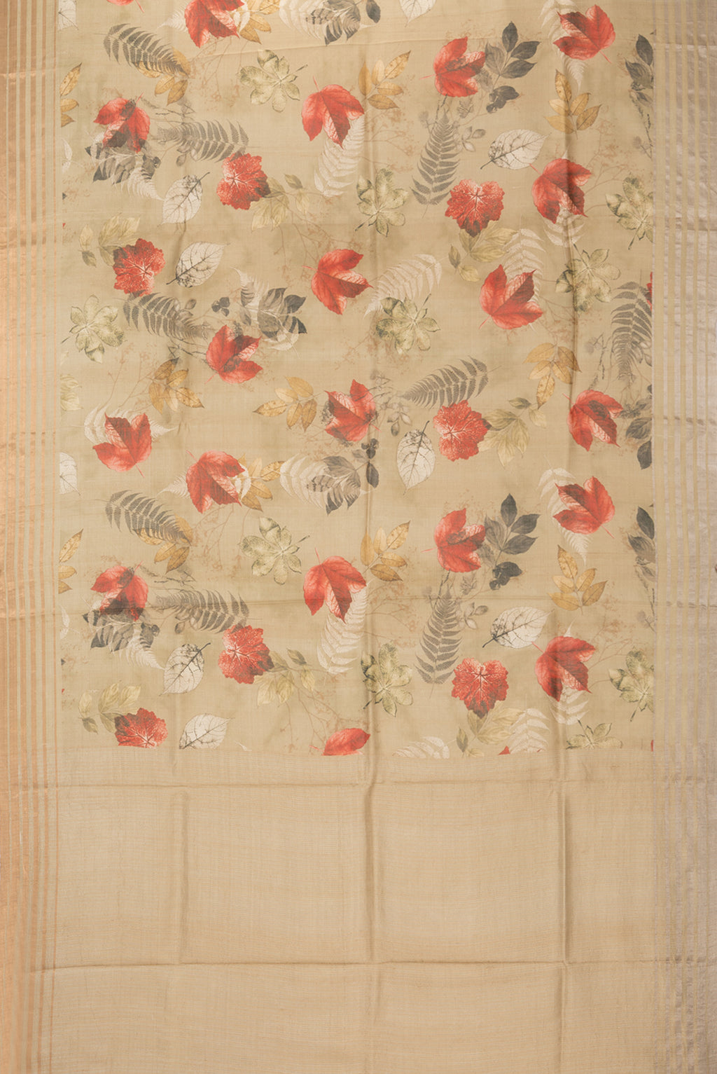Flat view of Golden Tussar Saree with Printed design on the body and Zari Border. 