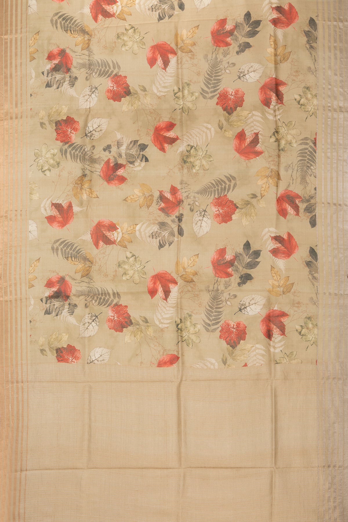 Flat view of Golden Tussar Saree with Printed design on the body and Zari Border. 