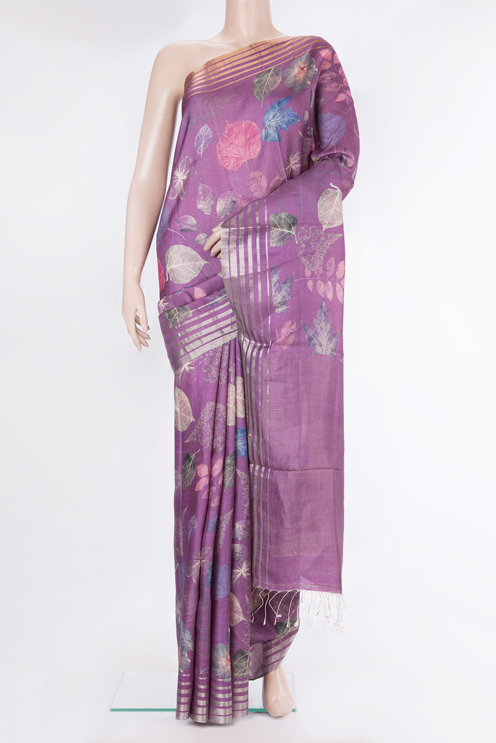 Purple Tussar Saree with Printed design on the body and Zari Border.  displayed on a mannequin