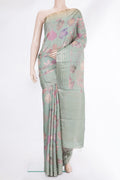 Sage Green Tussar Saree with Printed design on the body and Thin Zari Line.  displayed on a mannequin