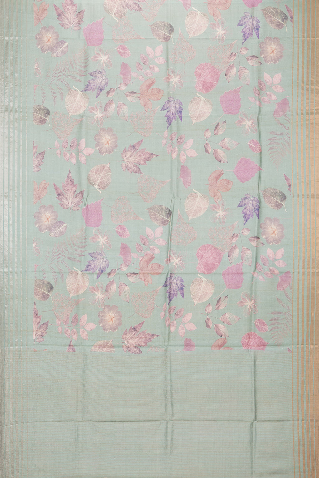 Flat view of Sage Green Tussar Saree with Printed design on the body and Thin Zari Line. 