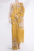 Yellow Tussar Saree with Floral Print on the body and Fancy Border.  displayed on a mannequin