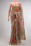 Dark Beige Tussar Saree with Stripes on the body and Zari Border.  displayed on a mannequin