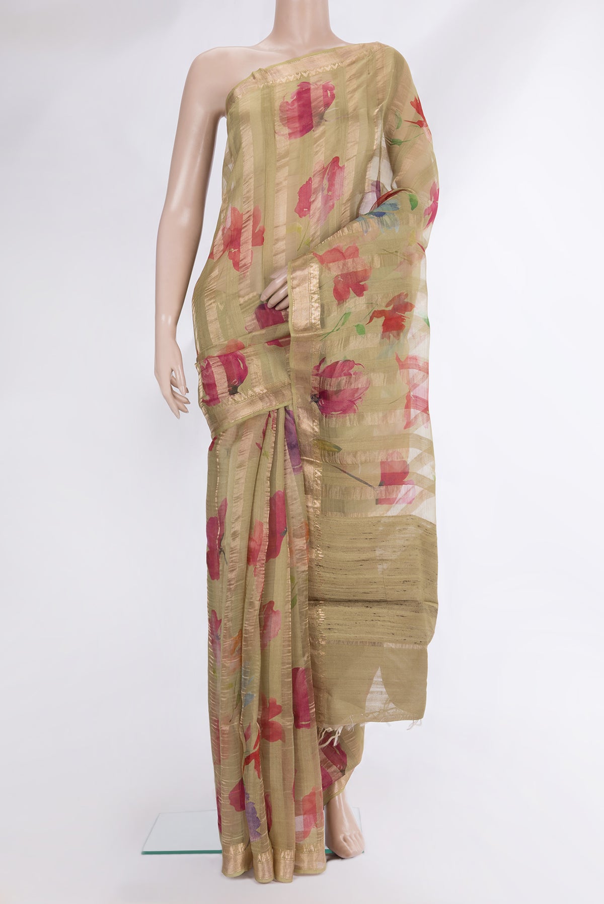 Dark Beige Tussar Saree with Floral Print on the body and Fancy Border.  displayed on a mannequin