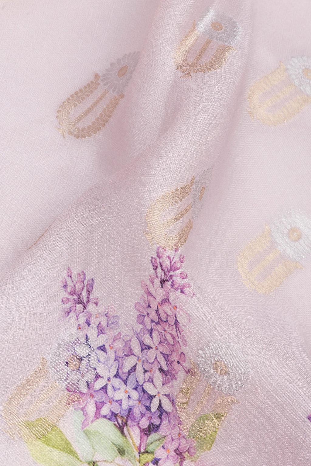 Close up of Pure Silk Rose Gold Dual Tone Tussar Saree with Printed design on the body and Without Border.  displaying folds