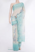 Cream Tussar Saree with Floral Print on the body and Fancy Border.  displayed on a mannequin