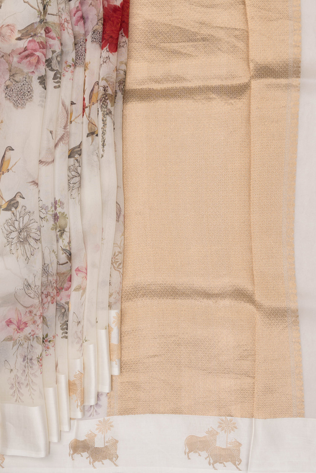 Pleats and pallu of Off White Organza Saree with Floral Print on the body and Fancy Border. 